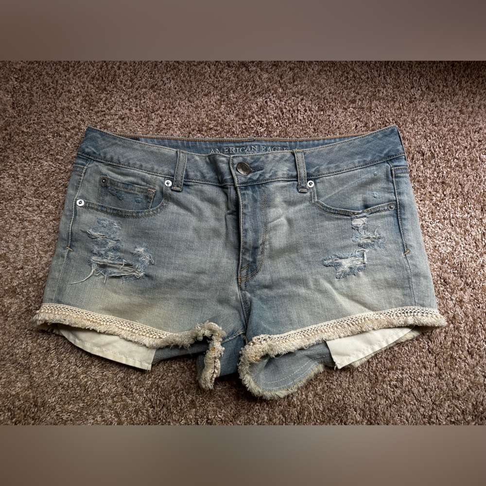 AEO American eagle light wash denim jeans with fringe detail size 12 NWT